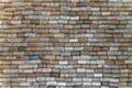 Wall covered in wine corks from various wineries