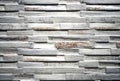 Wall covering for interior made of stoneware with scratched painted wood effect