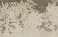 A wall with cracked plaster and white paint Royalty Free Stock Photo
