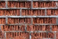 A wall of cracked red brick from the bad weather Royalty Free Stock Photo