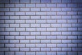 A wall of dark blue bricks. Background with a texture of brickwork. Royalty Free Stock Photo