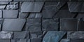 Wall of dark slate stones with sharp angular shapes and rough texture.