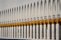 Wall of decorated, white and golden columns