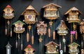 Wall of decorative pendulum clocks from Tyrol