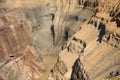 Wall of a diamond open pit consisting of solid rock