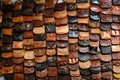 Wall display of leather bags at the craft fair. Leather bags in various colors, from brown to black