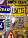 A display of vintage transport and motoring signs.