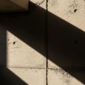 Wall displaying strong diagonal shadows, creating an abstract geometric Royalty Free Stock Photo