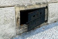 Wall with door for loading coal for heating from historic center Prague, Czech Republic (EU)