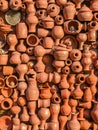 Wall of earthenware pots, jugs, vases, pots, mugs. The background.