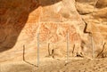 Wall in the Elands Bay cave with rock art Royalty Free Stock Photo