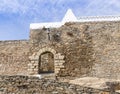 The wall and the entrance gate in Monsaraz town, Ãâ°vora District, Portugal Royalty Free Stock Photo