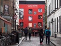 Wall of Fame famous musicians, Temple Bar, Dublin, Ireland as people walk by Royalty Free Stock Photo