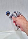 Wall faucet installation, for laundry tank, metal, chrome, skilled labor, do it yourself, plumber