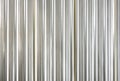 Wall or fence made of galvanized steel sheet has a small wavy appearance, is durable and strong Royalty Free Stock Photo