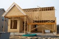 wall frame and rafters of a new plywood house wood plank