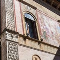 Wall with fresco on medieval palazzo in Vicenza