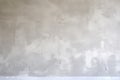 a wall freshly plastered, cement trowel beside it Royalty Free Stock Photo