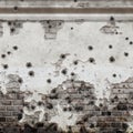 A wall full of bullet holes.