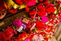 Wall full of red and pink love locks shaped as hearts Royalty Free Stock Photo