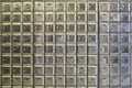 Wall full of rows of metal post office boxes Royalty Free Stock Photo