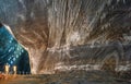 Wall of gallery with salt stalactites and bizarre ornaments in Salina Turda salt mine, Romania