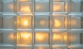 A wall of glass blocks with light shining through them Royalty Free Stock Photo