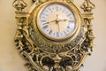 Wall goldish clock. Royalty Free Stock Photo