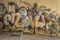 Wall with graffiti in an alley in the historic center of the city of Cagliari, Sardinia, Italy