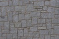 A wall of granite stones of different sizes Royalty Free Stock Photo