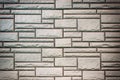 A wall of gray bricks of different sizes. Blank background with texture brickwork. Royalty Free Stock Photo