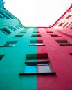 Wall with a colour edge of building in Saint-Petersburg well. Below view.