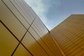 The wall of a high-rise building against the sky view from below Royalty Free Stock Photo