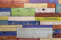 Wall from of horizontal colored painted wooden planks in different colors, surface texture, colorful background