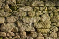 wall of irregular granite stone blocks, texture for background Royalty Free Stock Photo