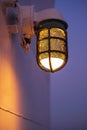 Wall Lamp. Vintage wall lighting at night time. Old ship lantern Royalty Free Stock Photo