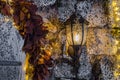 Wall lantern on stone with lights. night scene Royalty Free Stock Photo