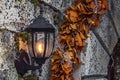Wall lantern on stone with lights Royalty Free Stock Photo