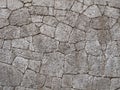 The wall of the large and rough stones. In warm tones