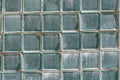 The wall is lined with numerous glass blocks Royalty Free Stock Photo