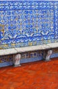 The wall is lined with tiled azulejo on the terrace of the Monas