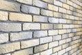 Wall with loft brick facing in yellow, white and gray