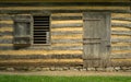 Wall of a Log Cabin with Doorway Royalty Free Stock Photo