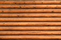 Wall of a log house wall with texture and wood Royalty Free Stock Photo