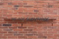 wall made of brick inside the famous Apartheid Museum in Johannesburg with the slogan \