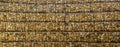 Wall made of gabions with stones. Stone wall with metal grid as background.