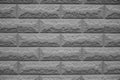 Wall made of light grey decorative bricks front view Royalty Free Stock Photo