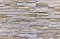 Wall of natural stone blocks of gray and sand color Royalty Free Stock Photo