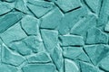 Wall made of old stones in cyan tone