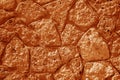 Wall made of old stones in orange tone Royalty Free Stock Photo